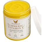 Jar of Nerys Natural Turmeric + Vitamin C brightening sugar scrub on a white background